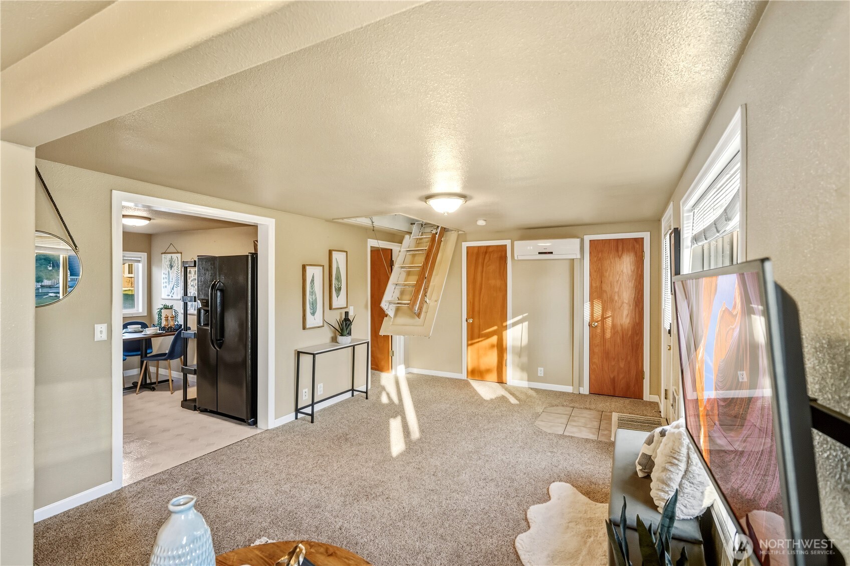 613 Hancock Street Port Townsend, WA 98368 - Photo 2 of 24 a living room with furniture and a flat screen tv