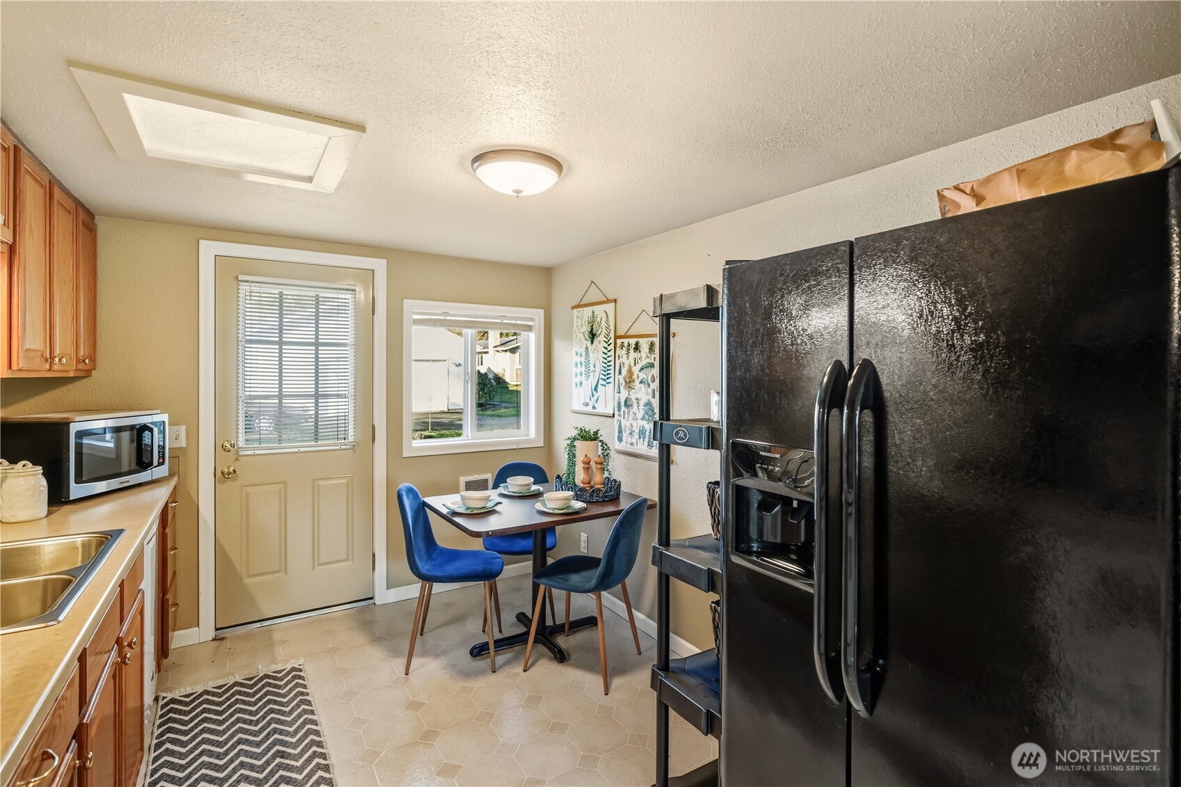 613 Hancock Street Port Townsend, WA 98368 - Photo 8 of 24 a view of a livingroom with furniture and a window