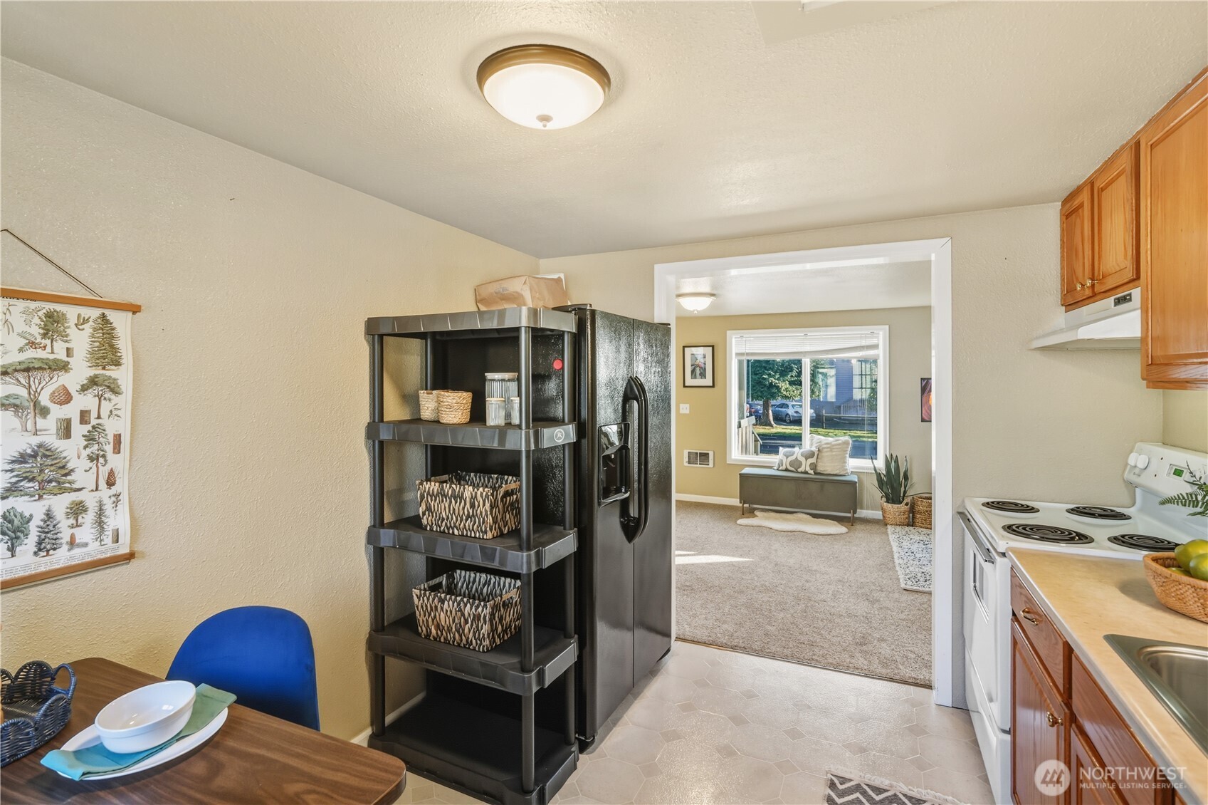 613 Hancock Street Port Townsend, WA 98368 - Photo 9 of 24 a living room with furniture a rug and a window