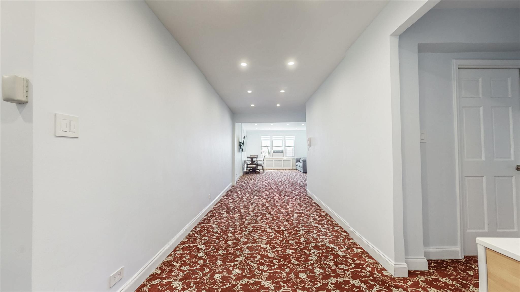 143-50 Hoover Avenue, Unit 507 Queens, NY 11435 - Photo 3 of 24 Corridor with baseboards, carpet floors, and recessed lighting