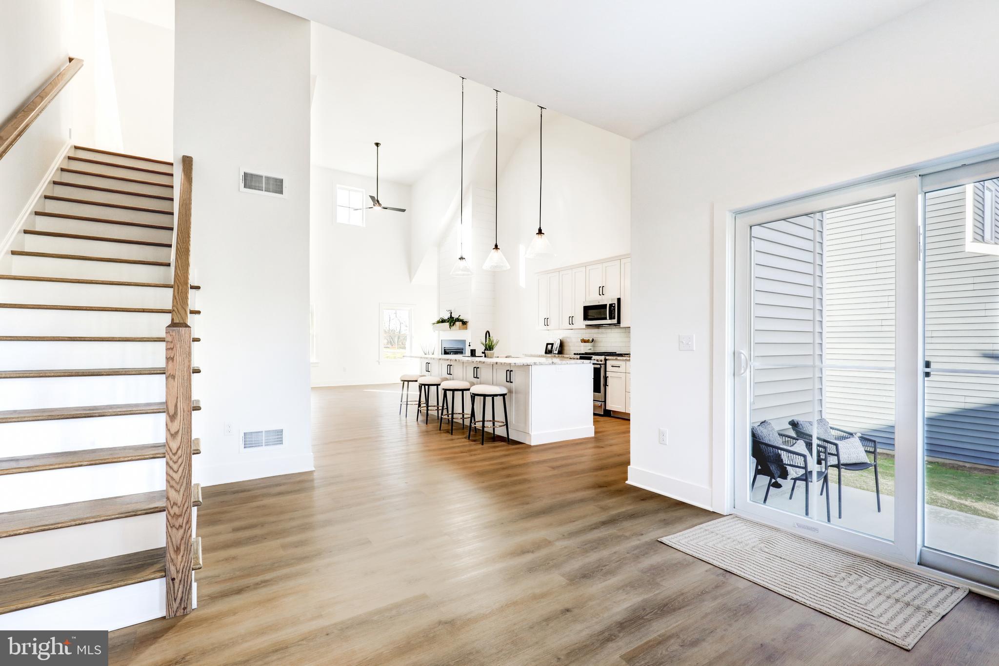 220 Parkside Place Lancaster, PA 17602 - Photo 16 of 49 a view of kitchen with furniture and wooden floor