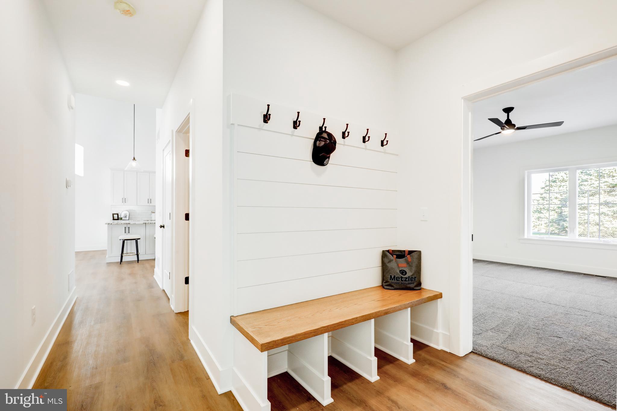 220 Parkside Place Lancaster, PA 17602 - Photo 19 of 49 a view of a room with wooden floor and lounge chair