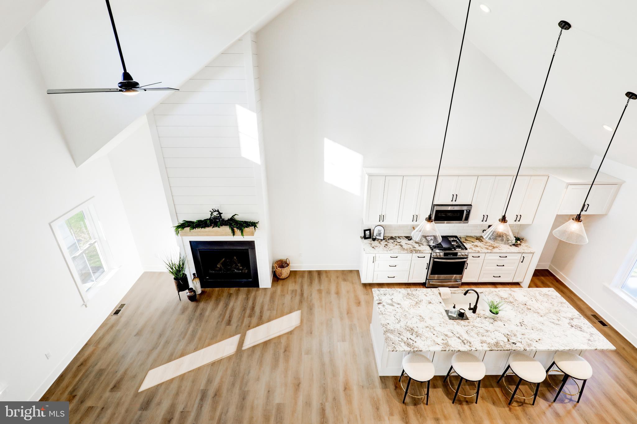 220 Parkside Place Lancaster, PA 17602 - Photo 28 of 49 a living room with furniture and a wooden floor
