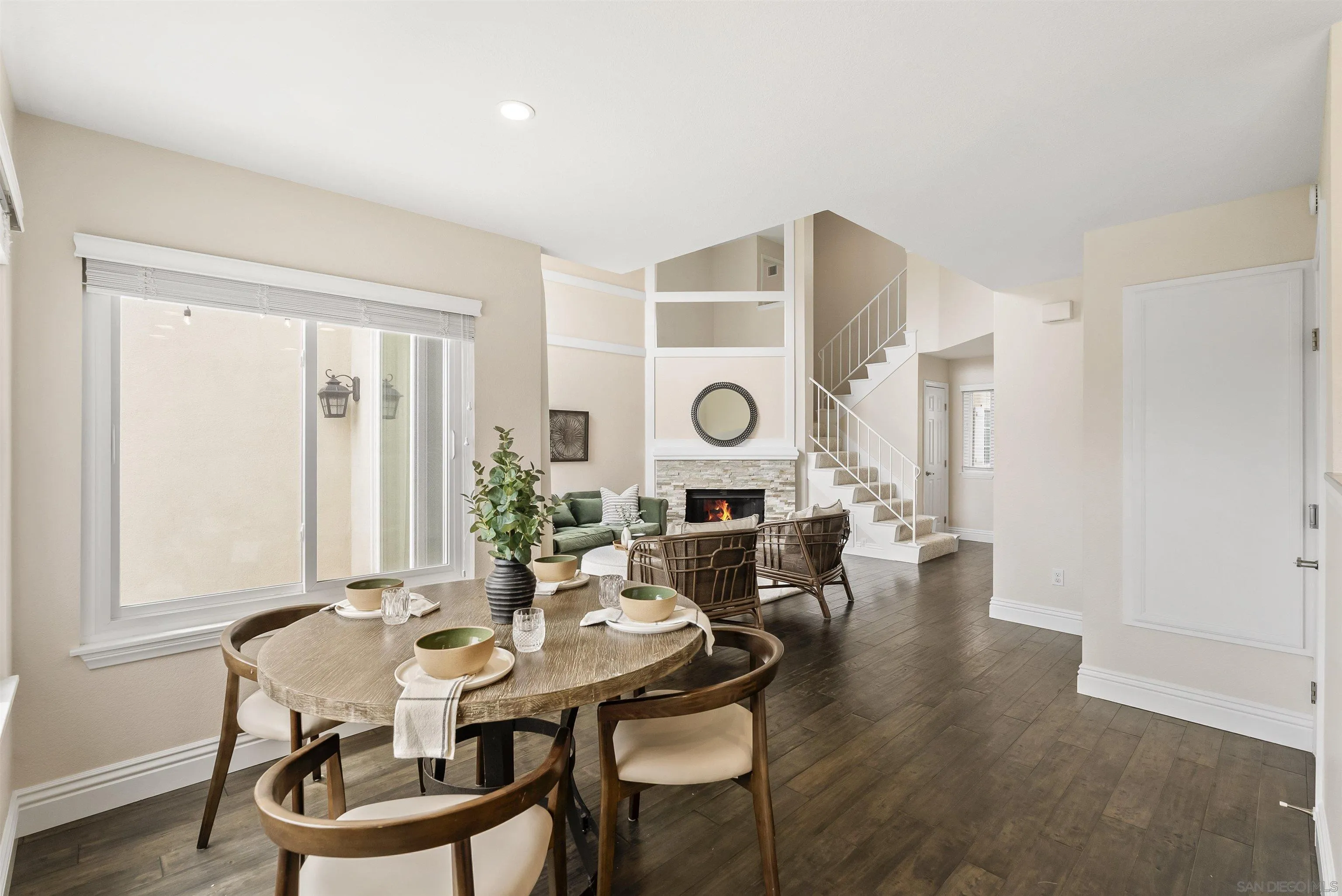 2691 Coventry Road Carlsbad, CA 92010 - Photo 4 of 19 a view of a dining room with furniture and wooden floor