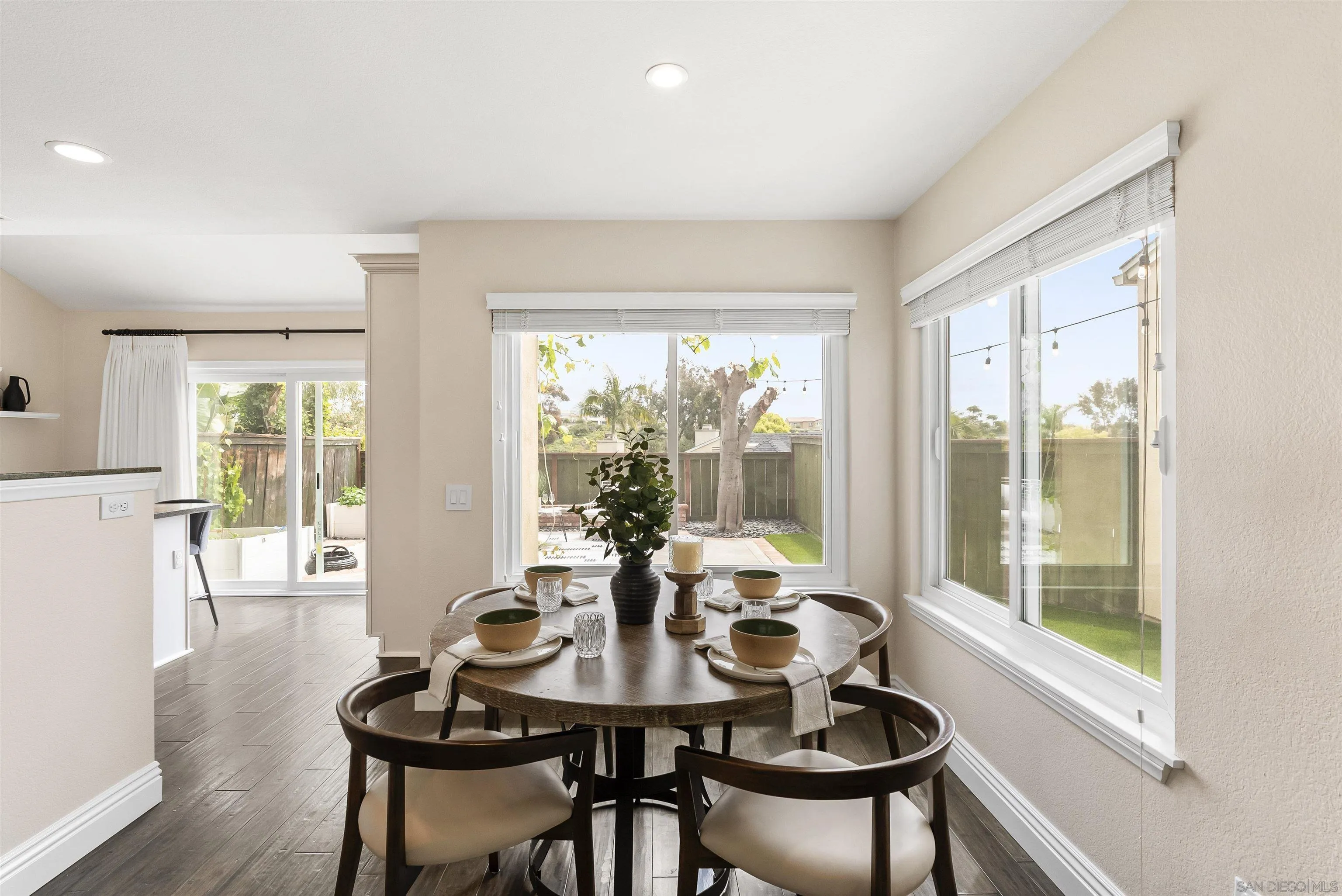 2691 Coventry Road Carlsbad, CA 92010 - Photo 5 of 19 a view of a dining room with furniture window and wooden floor