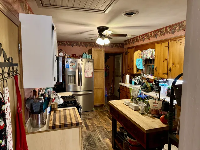 a room with lots of chairs and mirrors