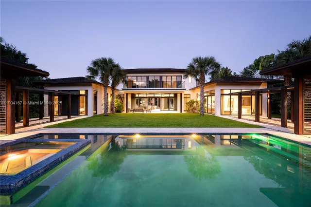 front view of a house with a swimming pool