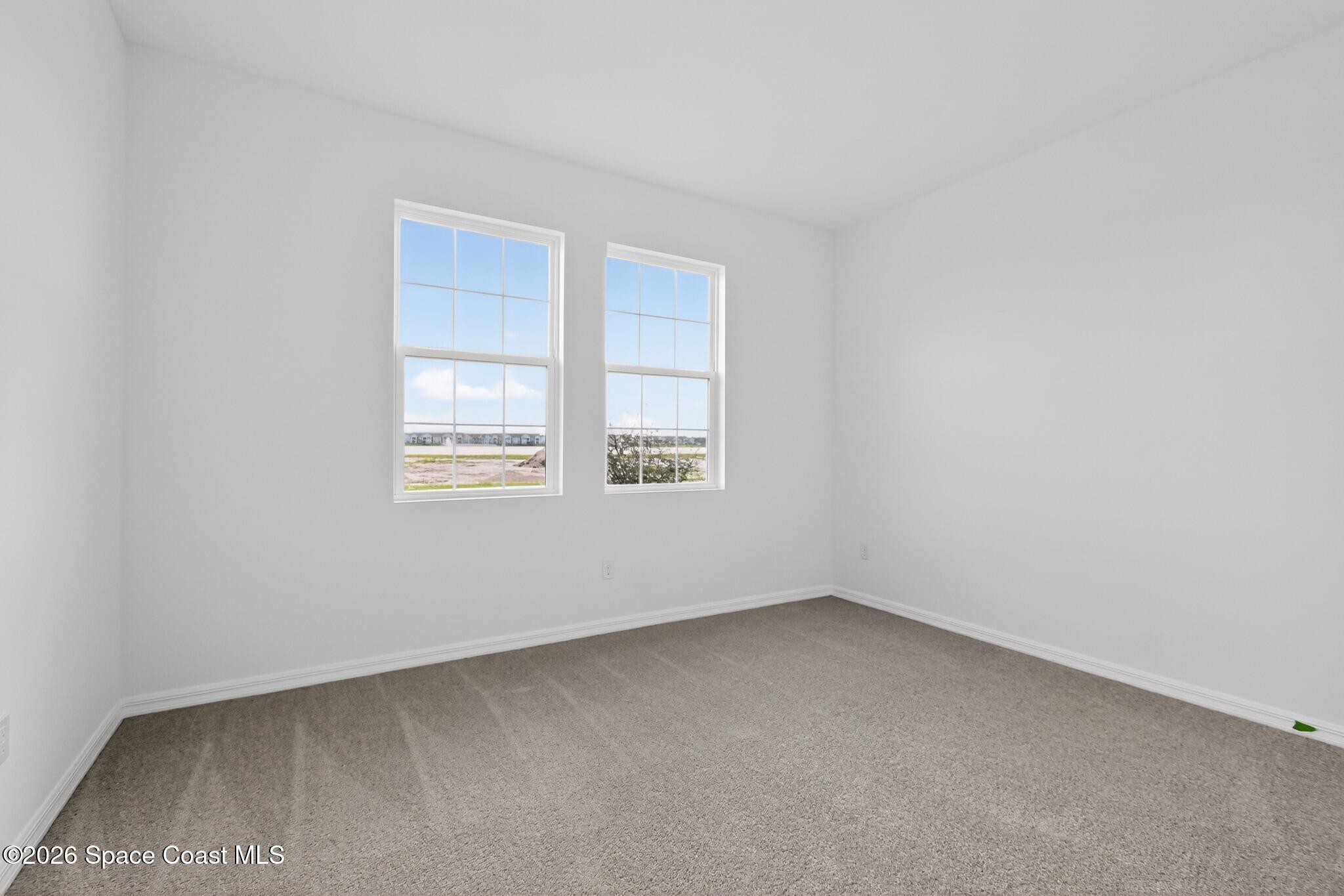 4372 Dockyard Drive Rockledge, FL 32955 - Photo 12 of 24 an empty room with a window