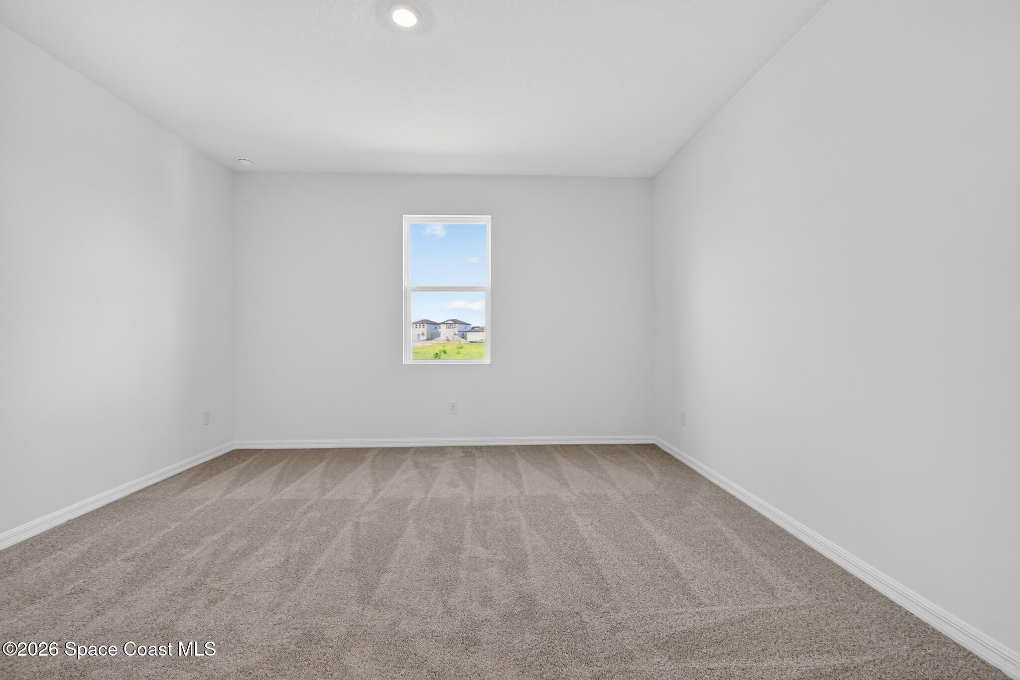 4372 Dockyard Drive Rockledge, FL 32955 - Photo 16 of 24 a view of an empty room with a window