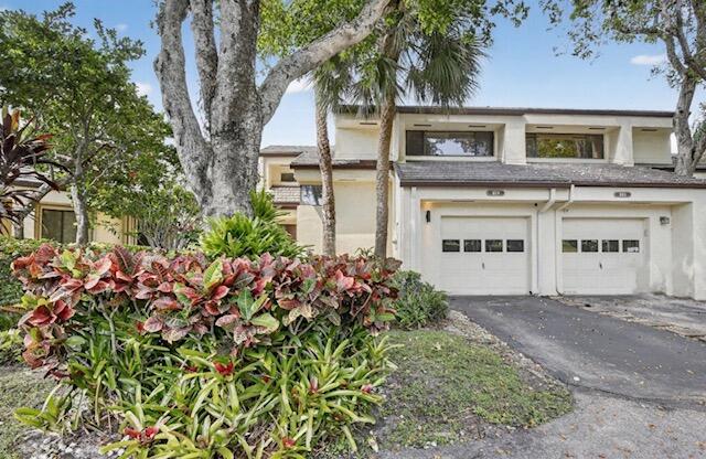 373 Northwest 94th Terrace Plantation, FL 33324 - Photo 3 of 10 front view of a house with a yard