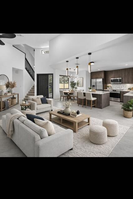 373 Northwest 94th Terrace Plantation, FL 33324 - Photo 8 of 10 a living room with furniture a rug and kitchen view
