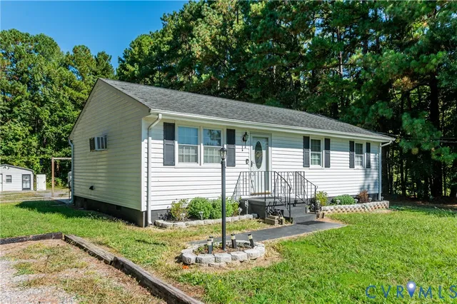 a house view with a garden space