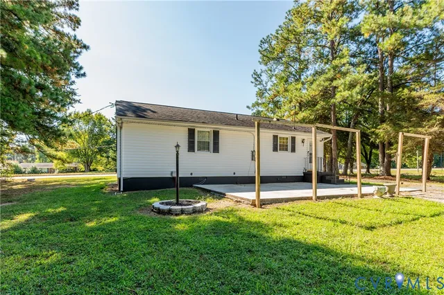 a house view with a backyard space
