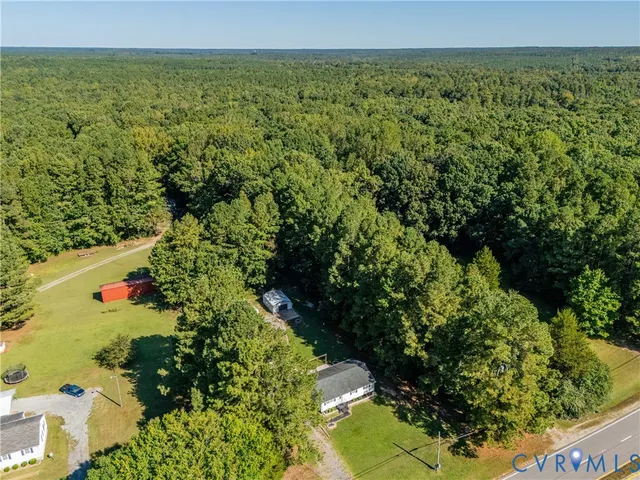 a view of a lake with a building in the background