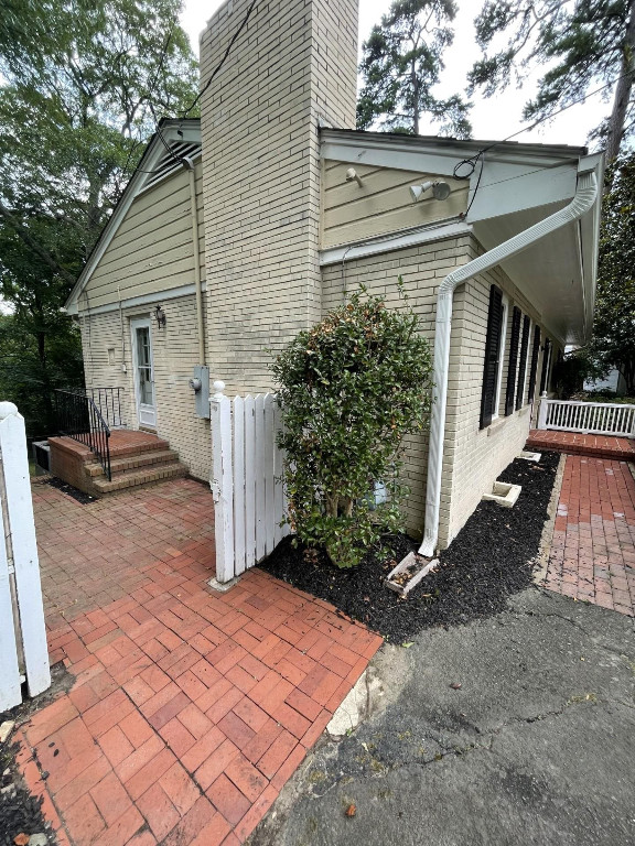 200 East Drewry Lane Raleigh, NC 27609 - Photo 5 of 22 a view of a house with a yard