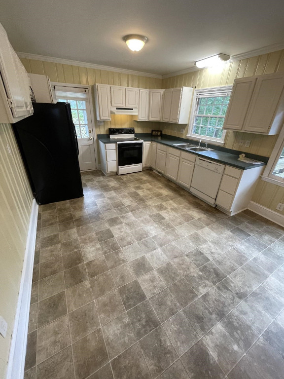 200 East Drewry Lane Raleigh, NC 27609 - Photo 6 of 22 a kitchen with granite countertop a sink and a stove top oven