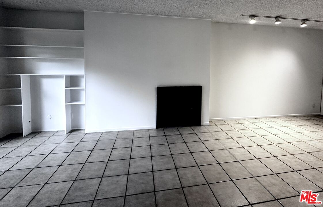 1119 Raintree Circle Culver City, CA 90230 - Photo 2 of 13 a view of an empty room and window