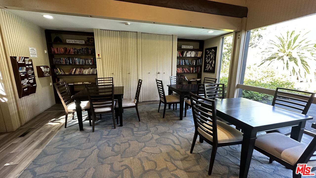 1119 Raintree Circle Culver City, CA 90230 - Photo 7 of 13 a view of a dining room with furniture and window