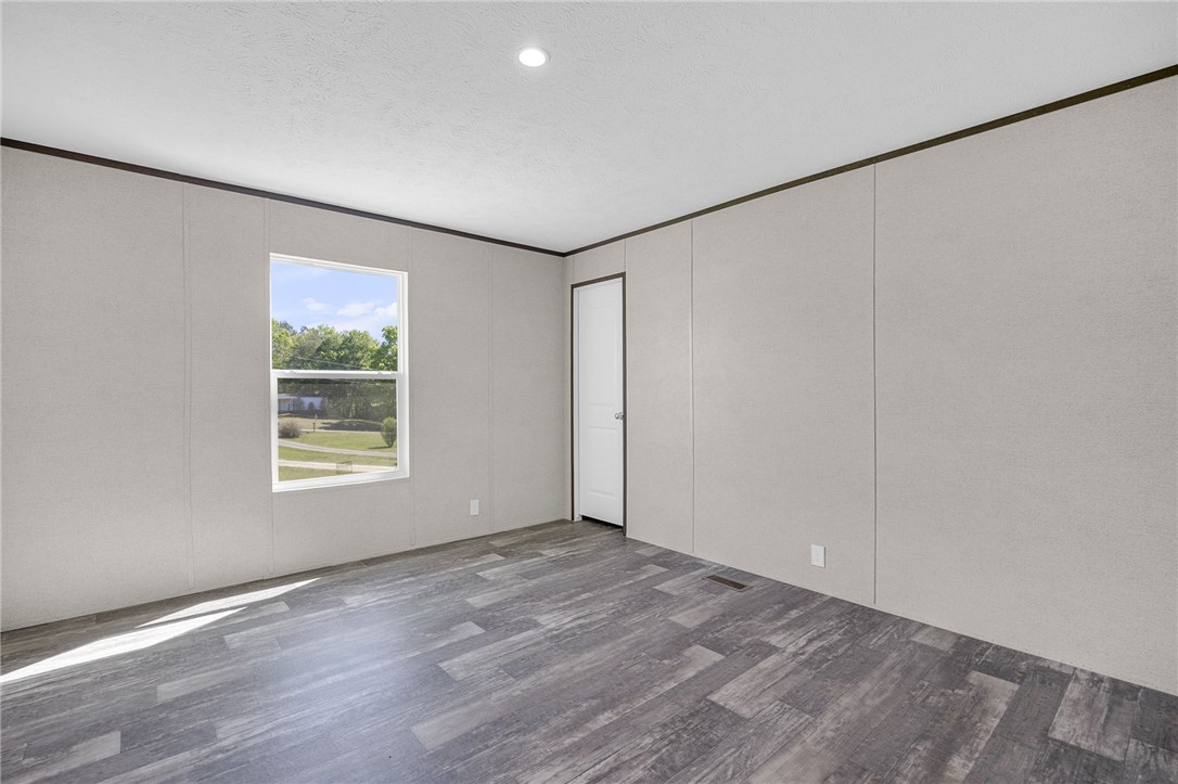 375 Griggs Road Six Mile, SC 29682 - Photo 20 of 36 This bright room features durable flooring and abundant natural light, creating a welcoming atmosphere.