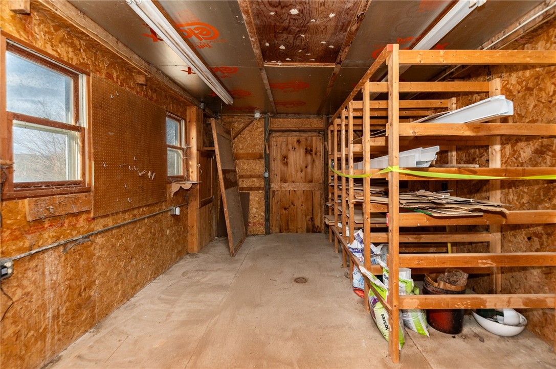 1153 Wyoming Road Covington, NY 14591 - Photo 33 of 36 outbuilding wood storage