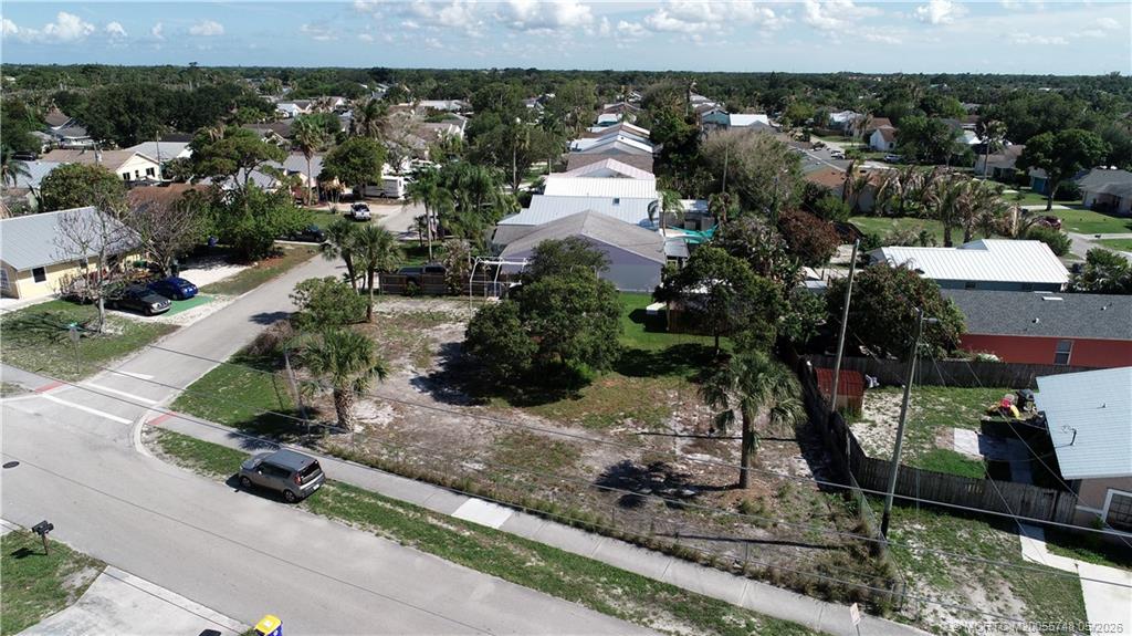 5152 Southeast Primrose Way Stuart, FL 34997 - Photo 11 of 13 an aerial view of multiple house