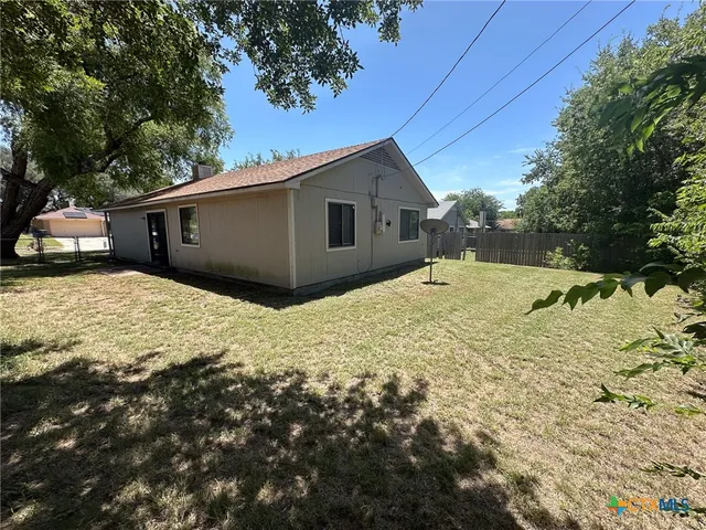 a view of gallery with wooden floor