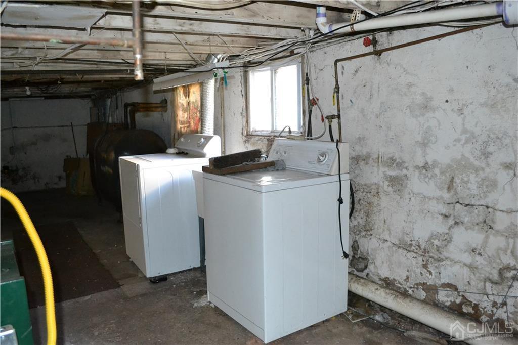635 Front Street Dunellen, NJ 08812 - Photo 15 of 18 a utility room with dryer and washer
