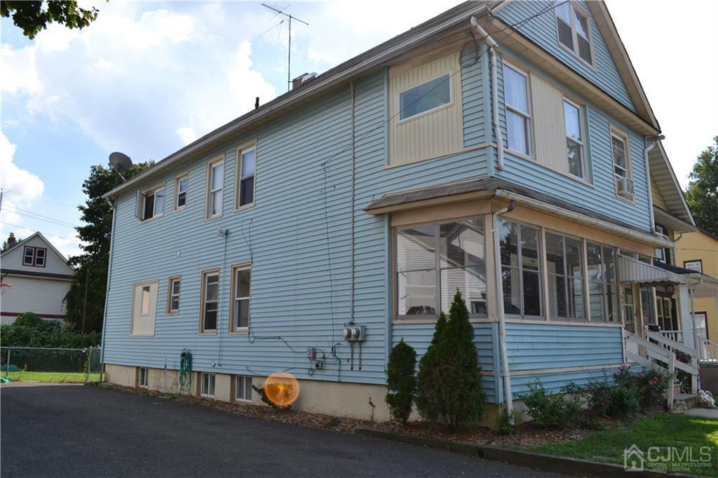 635 Front Street Dunellen, NJ 08812 - Photo 2 of 18 a view of a building with a street