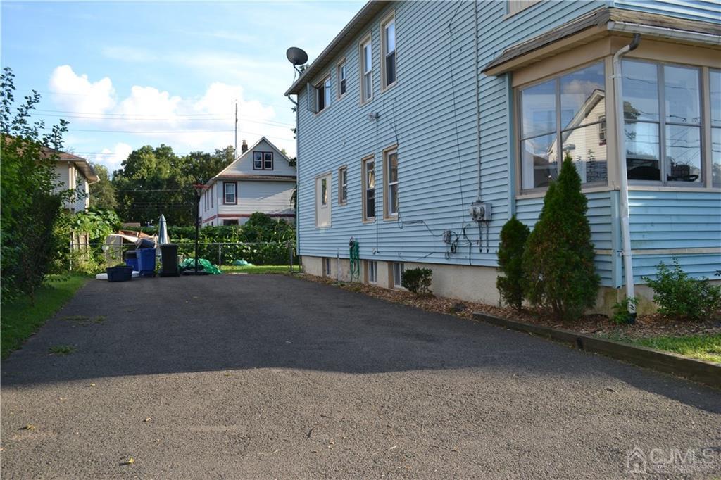 635 Front Street Dunellen, NJ 08812 - Photo 3 of 18 a view of a house with a street