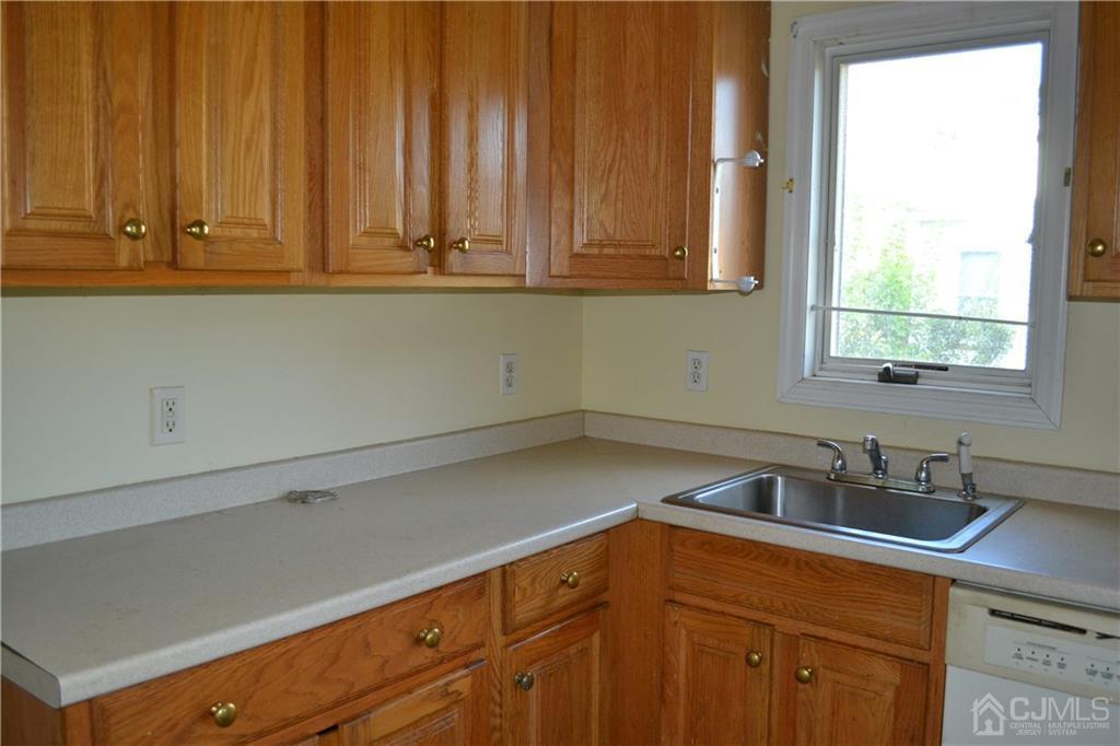 635 Front Street Dunellen, NJ 08812 - Photo 6 of 18 a kitchen with a sink and cabinets
