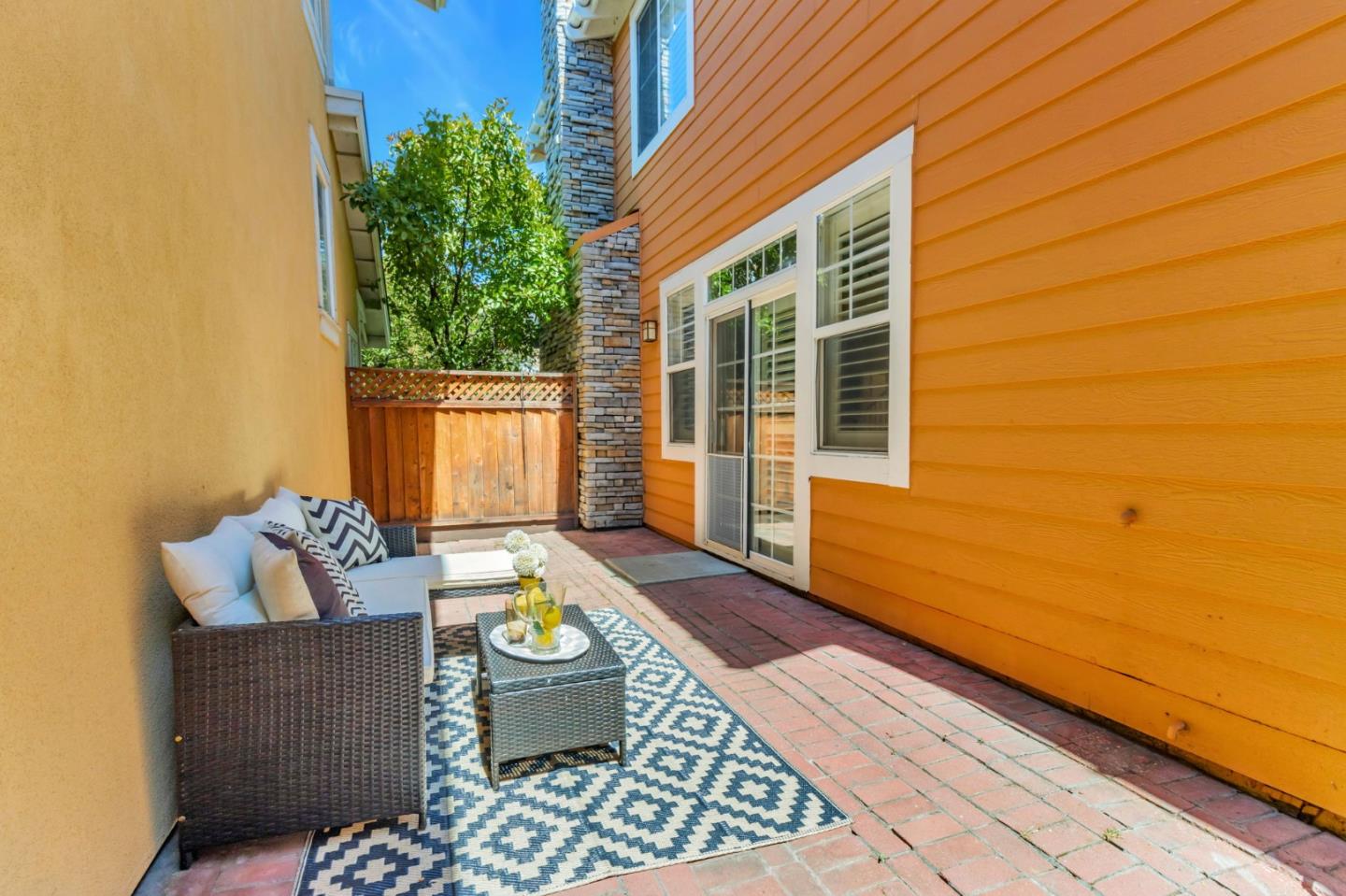 72 Cannery Circle Campbell, CA 95008 - Photo 30 of 31 a balcony with furniture and a potted plant