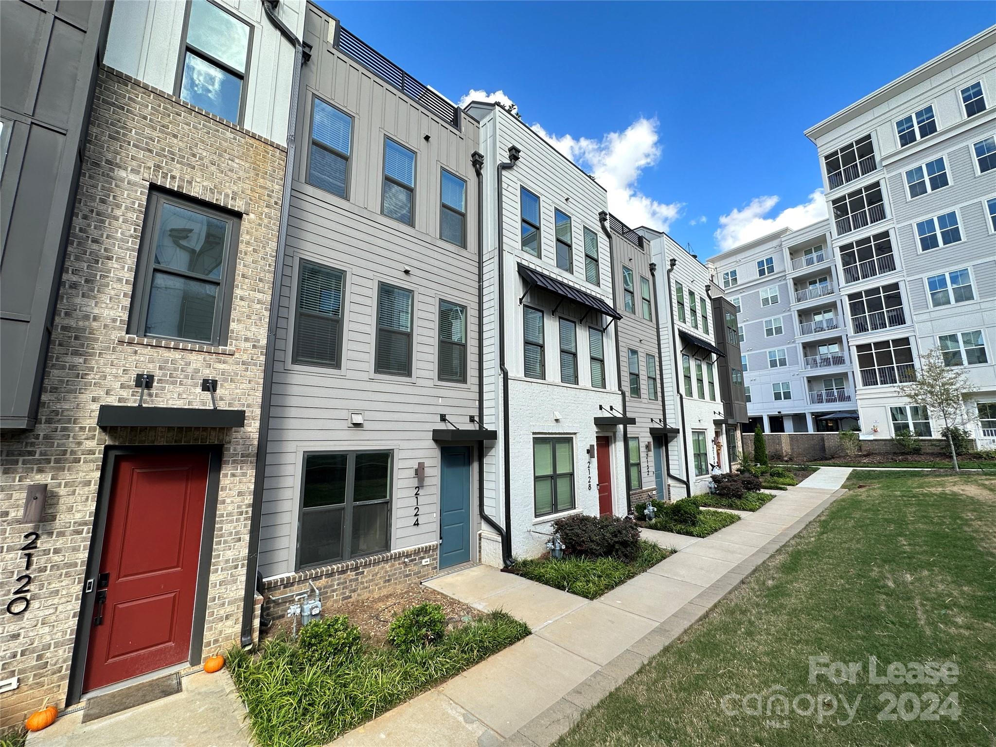 2124 Terwilliger Trail Charlotte, NC 28203 - Photo 2 of 36 a front view of a building with a yard