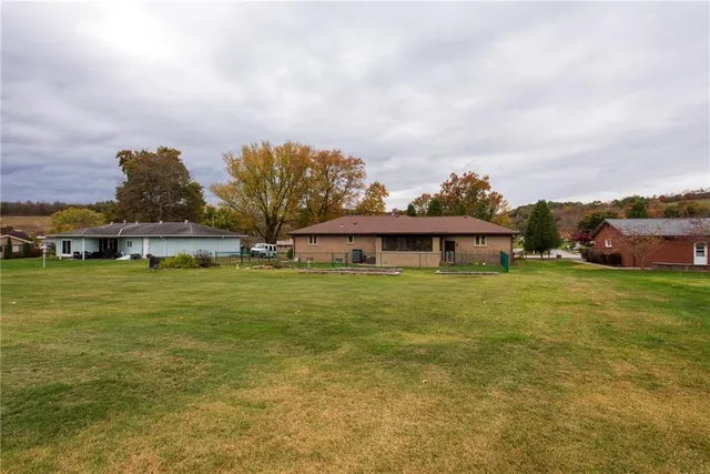 a view of beach and yard