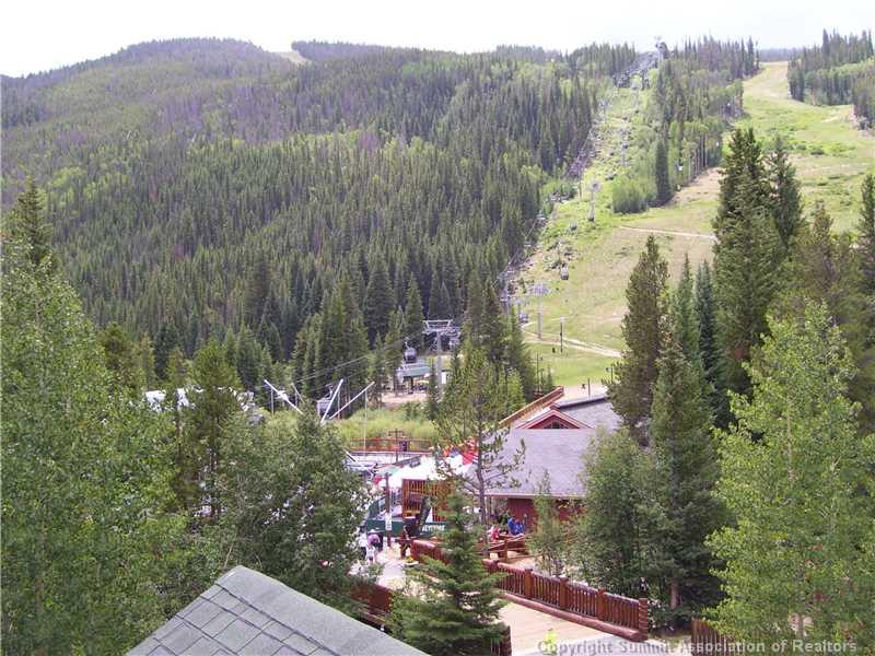 195 River Run Road, Unit 8012 Keystone, CO 80435 - Photo 12 of 19 a view of a house with a yard