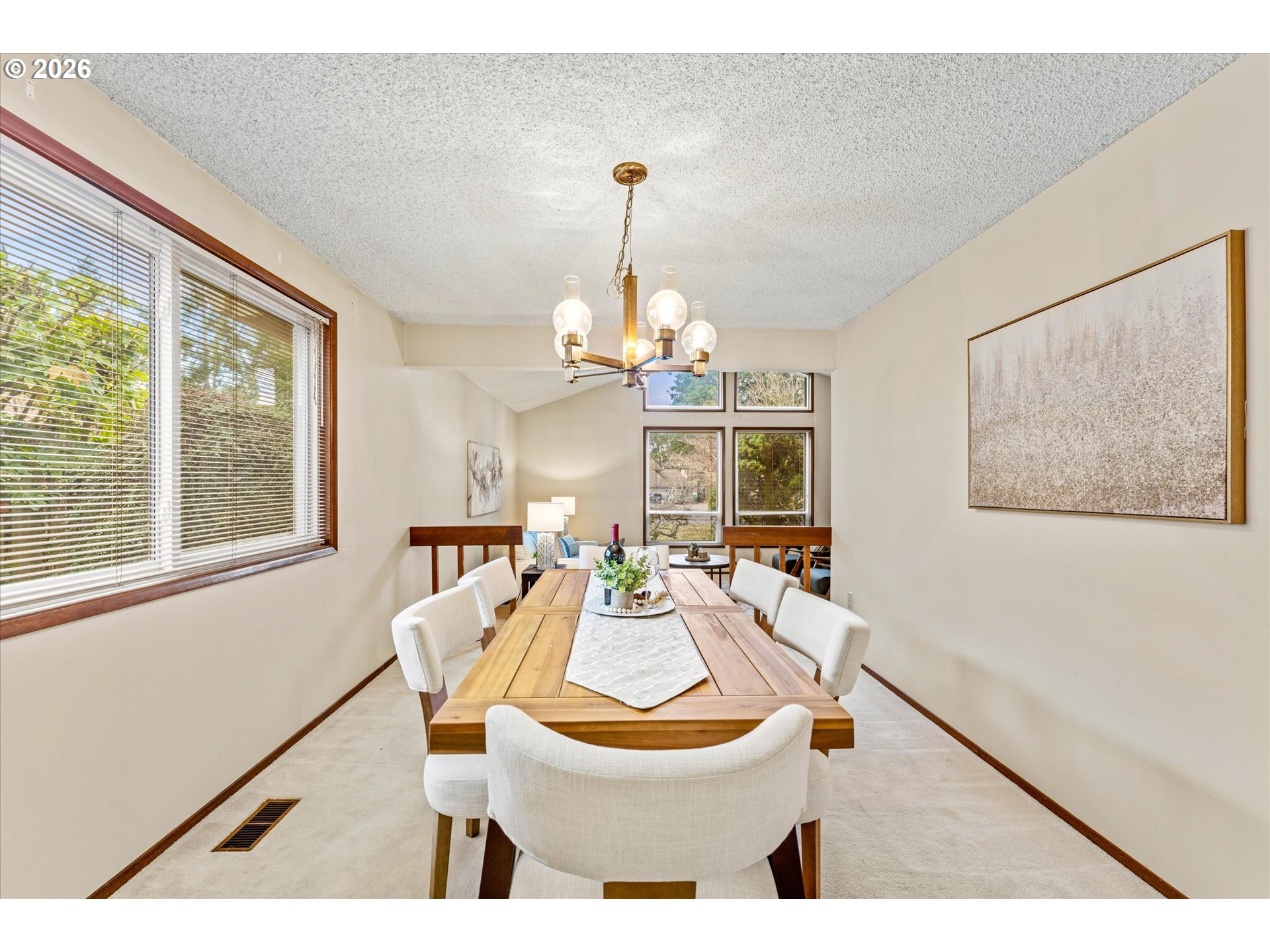 6740 Southwest Hyland Way Beaverton, OR 97008 - Photo 11 of 38 a dining room with furniture window and wooden floor
