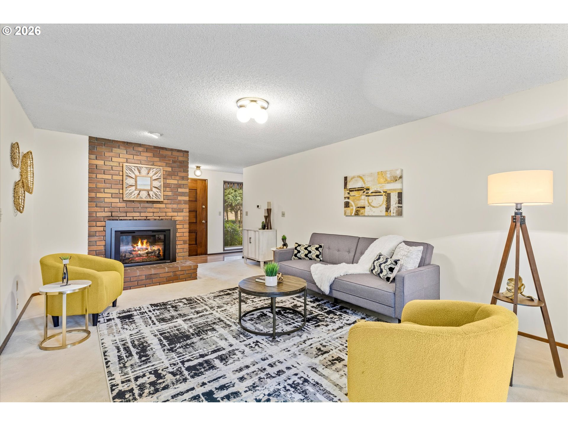 6740 Southwest Hyland Way Beaverton, OR 97008 - Photo 18 of 38 a living room with furniture and a fireplace