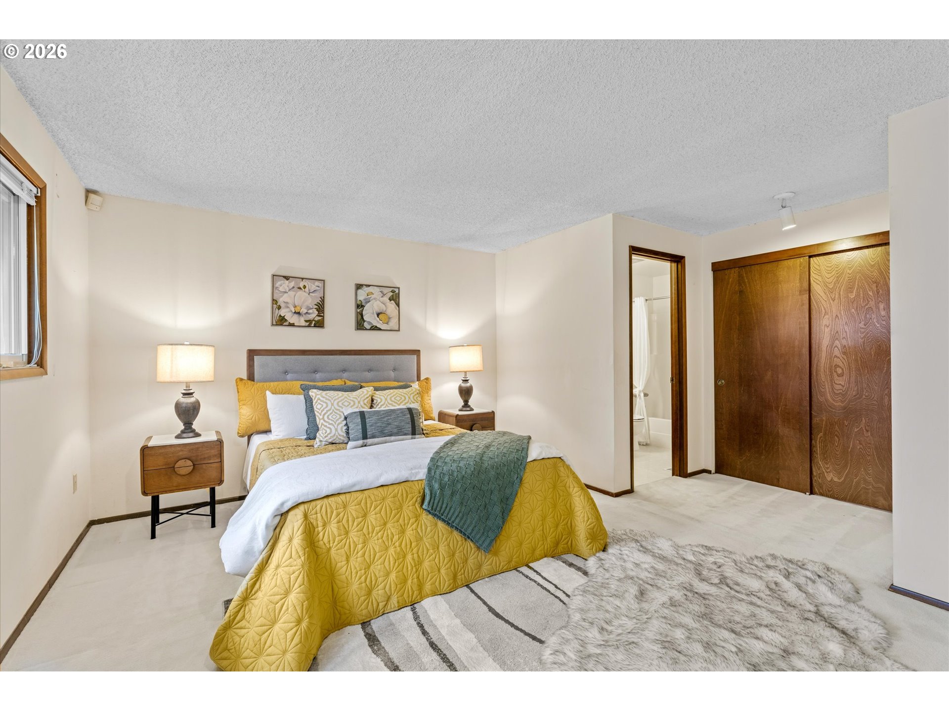 6740 Southwest Hyland Way Beaverton, OR 97008 - Photo 25 of 38 a bedroom with a bed and a table