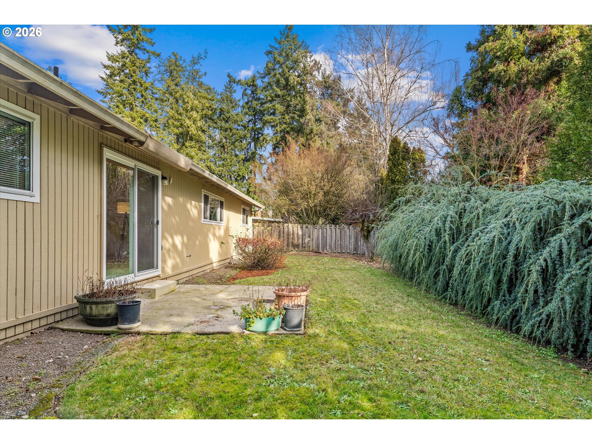 6740 Southwest Hyland Way Beaverton, OR 97008 - Photo 33 of 38 a house view with a backyard space