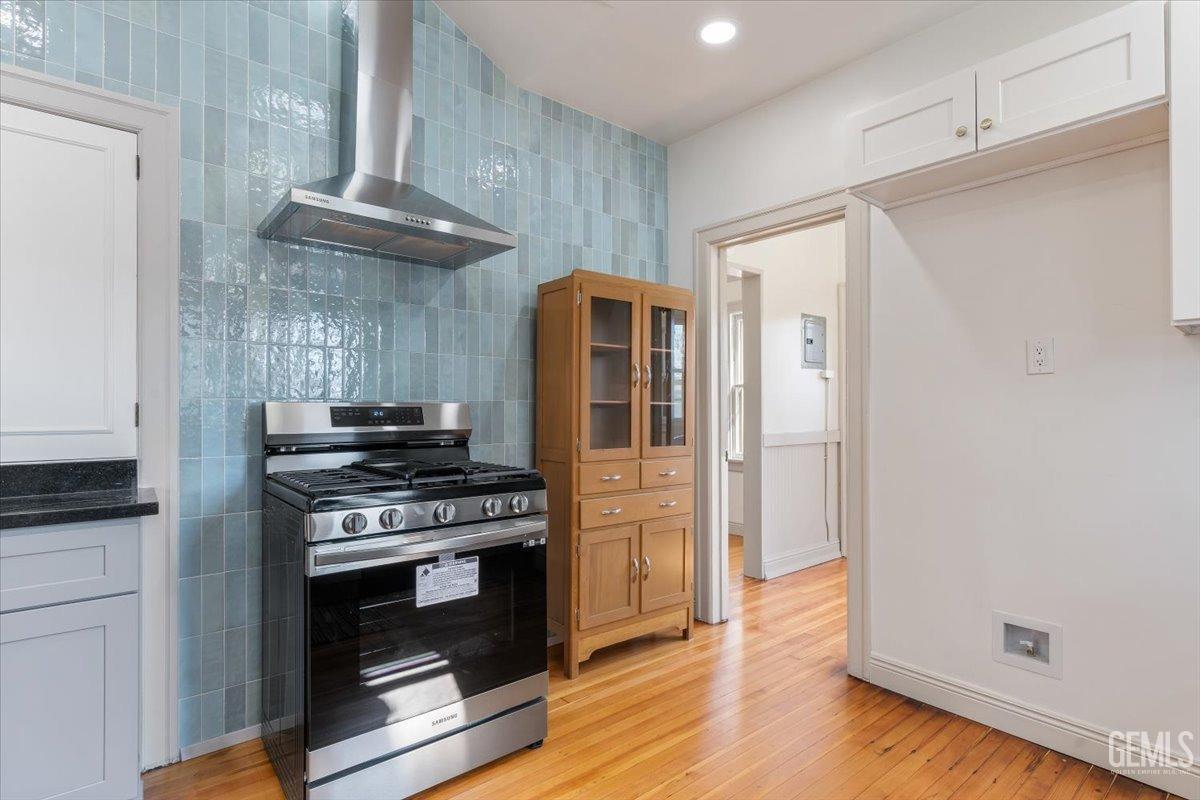 Undisclosed Address Bakersfield, CA 93305 - Photo 17 of 49 a kitchen with stainless steel appliances granite countertop a stove and a refrigerator