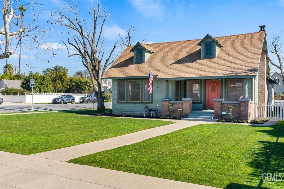 Undisclosed Address Bakersfield, CA 93305 - Photo 2 of 49 a view of a house with a yard porch and sitting area