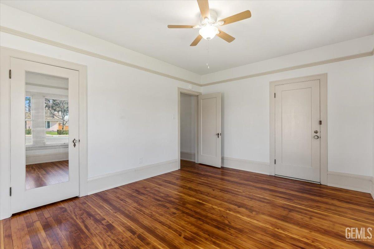 Undisclosed Address Bakersfield, CA 93305 - Photo 35 of 49 a view of empty room with wooden floor