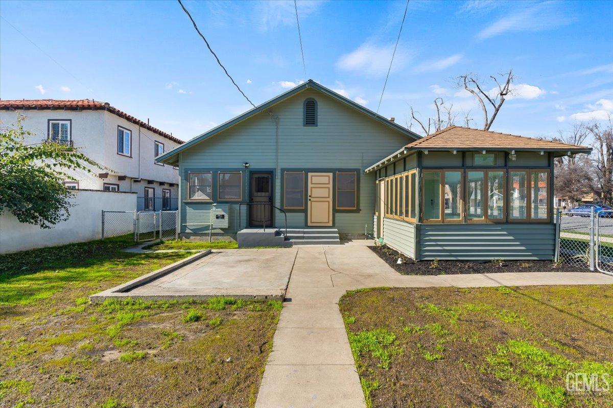 Undisclosed Address Bakersfield, CA 93305 - Photo 40 of 49 a front view of a house with garden