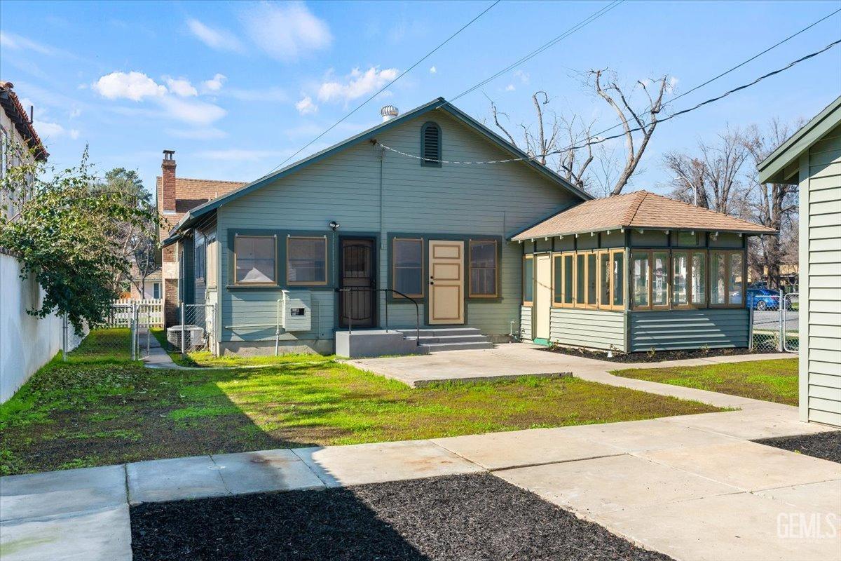 Undisclosed Address Bakersfield, CA 93305 - Photo 41 of 49 a front view of a house with a yard