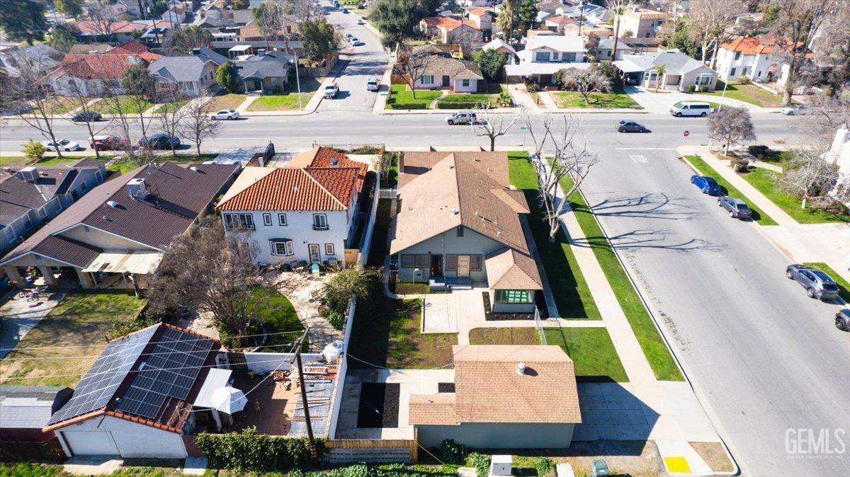 Undisclosed Address Bakersfield, CA 93305 - Photo 45 of 49 an aerial view of residential houses with outdoor space and parking
