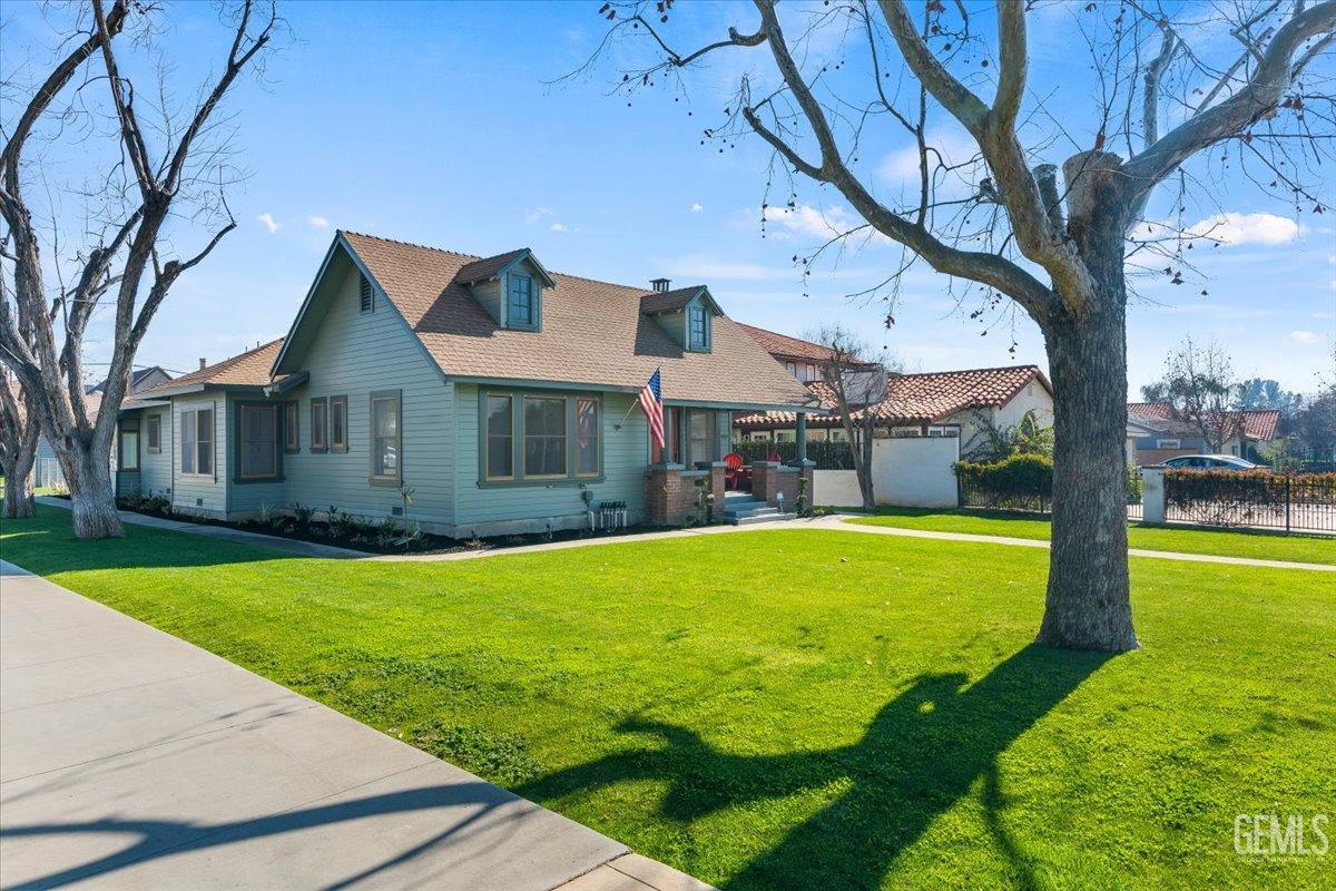 Undisclosed Address Bakersfield, CA 93305 - Photo 6 of 49 a view of a house with a yard