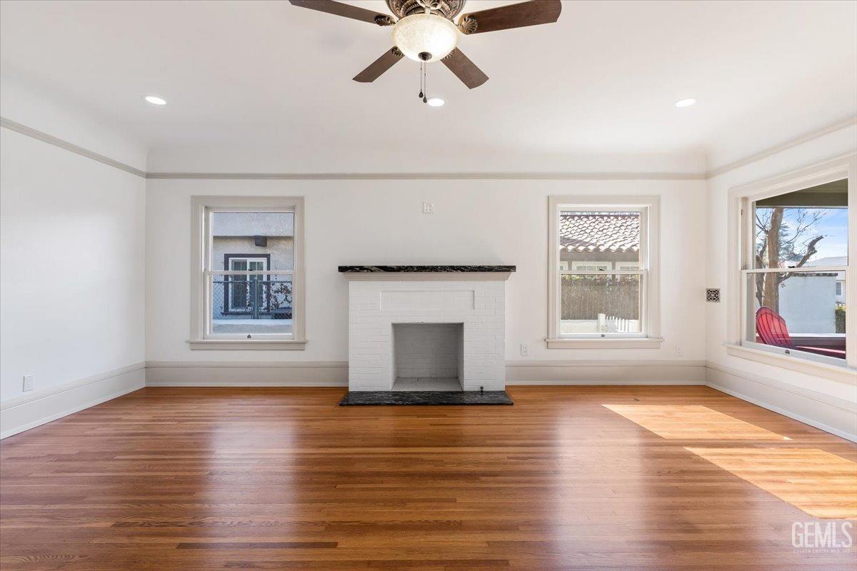 Undisclosed Address Bakersfield, CA 93305 - Photo 10 of 49 a view of empty room with window and fireplace