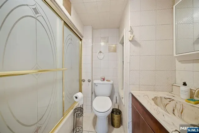 a view of storage and utility room with empty racks