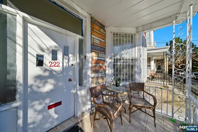 a view of a building with sitting area