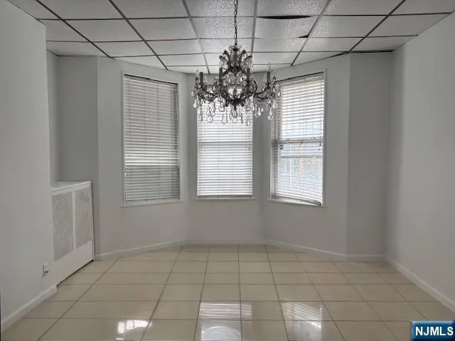 a kitchen with a stove and a refrigerator