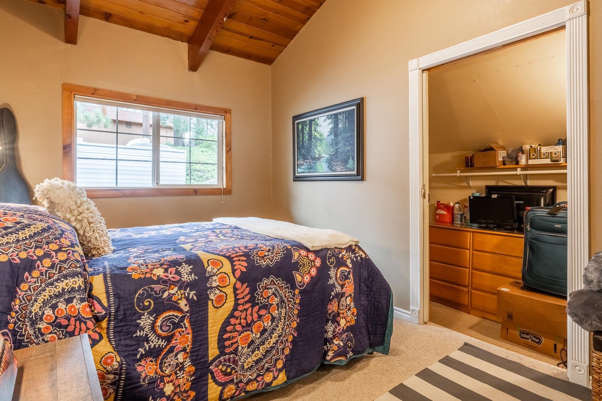 182 Davison Road Mammoth Lakes, CA 93546 - Photo 12 of 25 a bedroom with a bed and a dresser